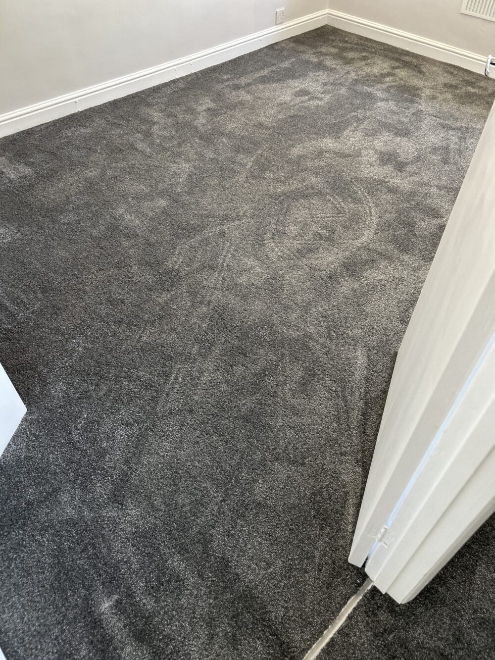 Grey carpet fitted to bedroom in West Drayton