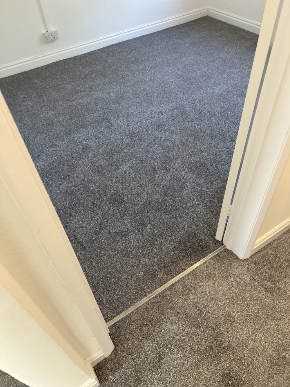 Grey carpet fitted to bedroom in West Drayton