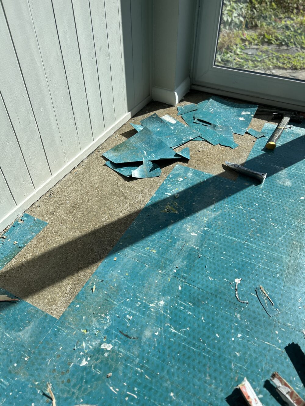 Uplifting Old Marley tiles on kitchen & dinner floor in West Drayton