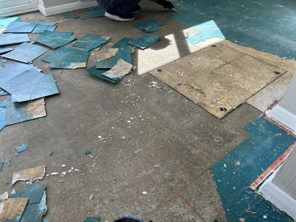 Uplifting Old Marley tiles on kitchen & dinner floor in West Drayton