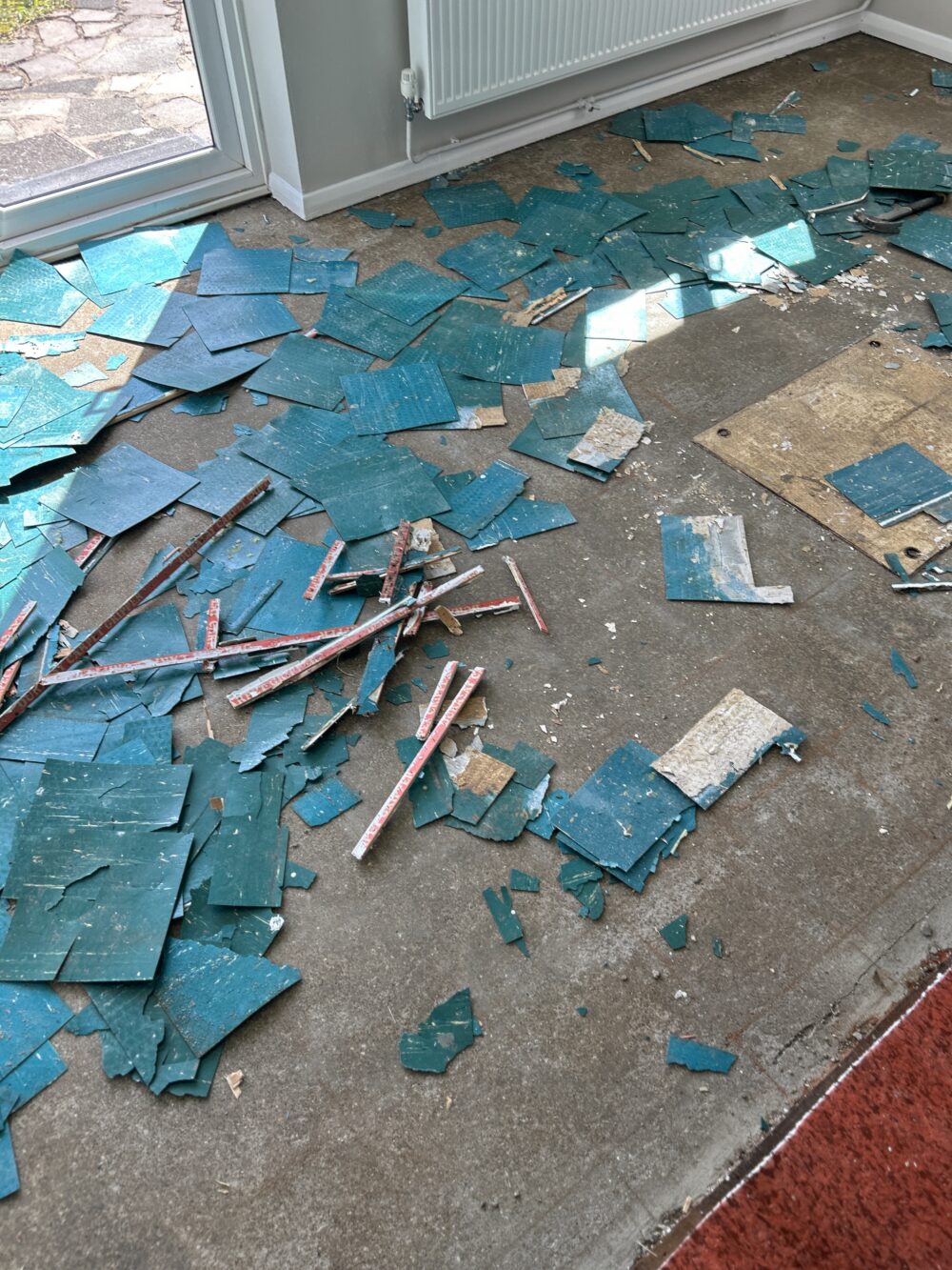 Uplifting Old Marley tiles on kitchen & dinner floor in West Drayton